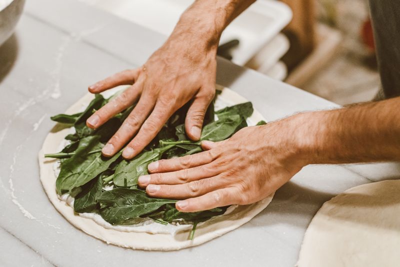 Spinach and ricotta stuffed pizza vegetarian option
